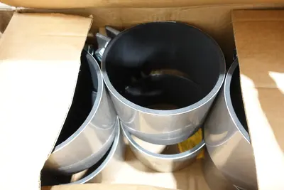 2 PALLETS OF JCM UNIVERSAL CLAMP COUPLINGS, ASSORTED SIZES