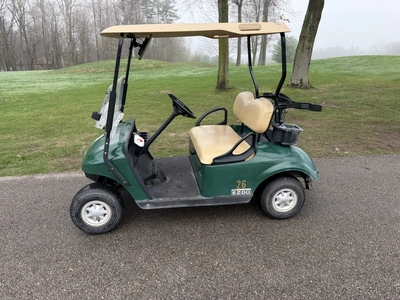 (1) 2015 E-Z-Go golf cart with a Kawasaki gas engine, does not include Club canopy, includes ball wa...