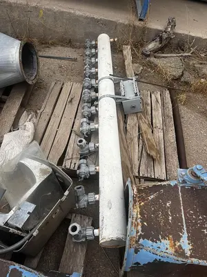 Air conveying scrap system with 100's of feet of piping