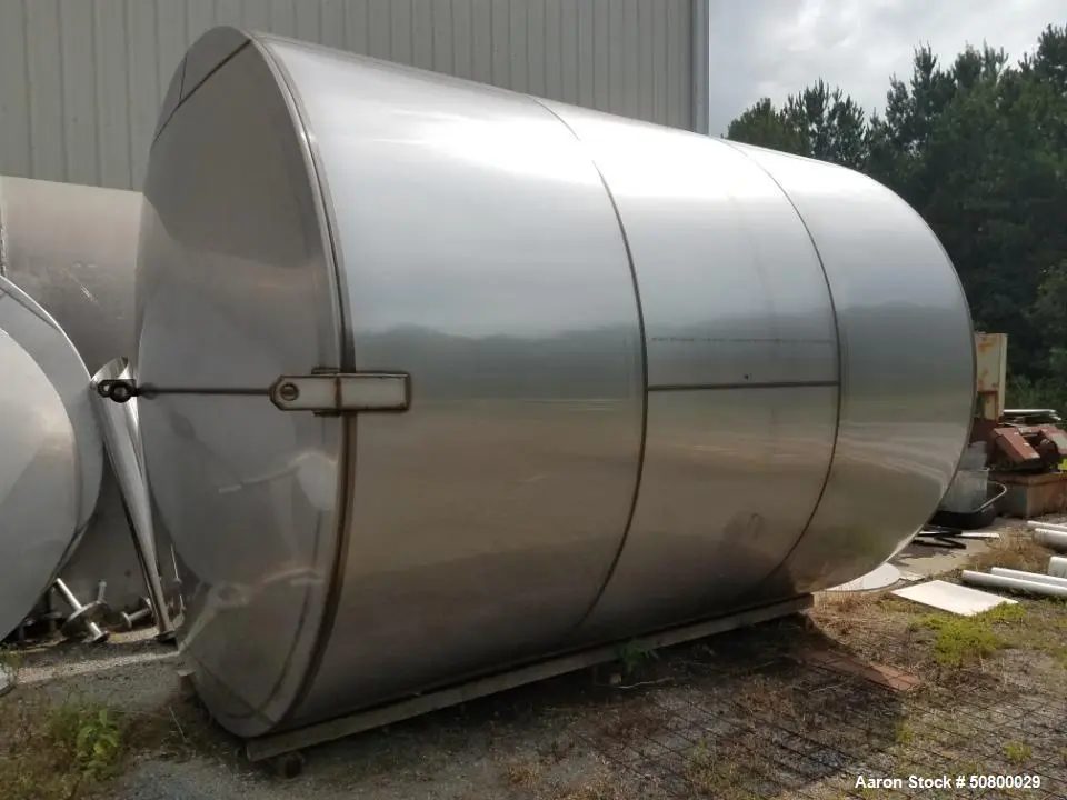Unused 6,500 Gallon 304 Stainless Steel Vertical Tank