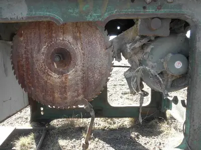 USED METAL TABLE SAW -