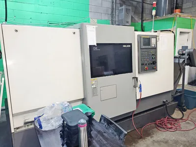 2007 HWACHEON CUTEX-240A/SMC CNC Lathes | CNCsurplus (1)