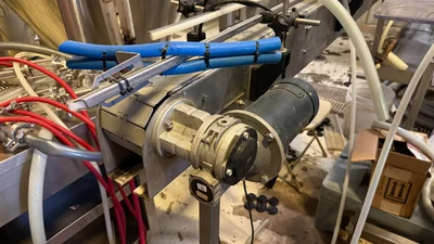 Wild Goose 4 head filler and seamer with depalletizer