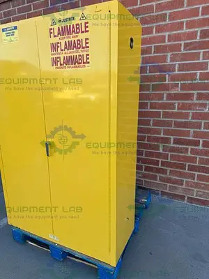 USED JUSTRITE 45 GALLON FLAMMABLE LIQUID STORAGE CABINET W/ SHELVES, KEY