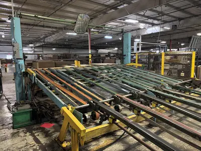 86" x 185" Universal 2 color Flexo Rotary Slotter, Sauer tooling, Sheet Stacker, Hydraulic platform lift