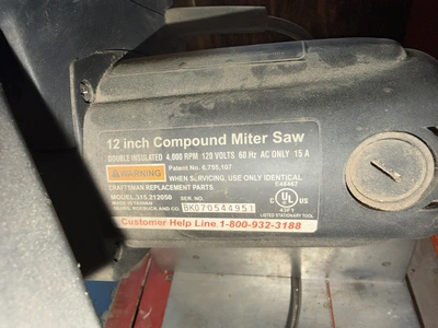 (1) Craftsman 12" compound miter saw, 120V, in working condition.