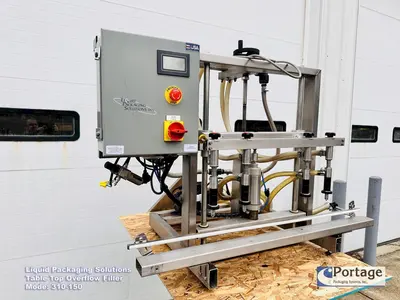 USED 2010 LIQUID PACKAGING 310-150 TT OVERFLOW FILLER