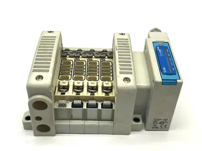 VV5QC21-04N3SDB-S | SMC  Integrated Type Base Mount Plug-In Manifold - Used