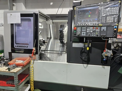 OKUMA 3-axis CNC Lathe, condition of a new, VIDEOS