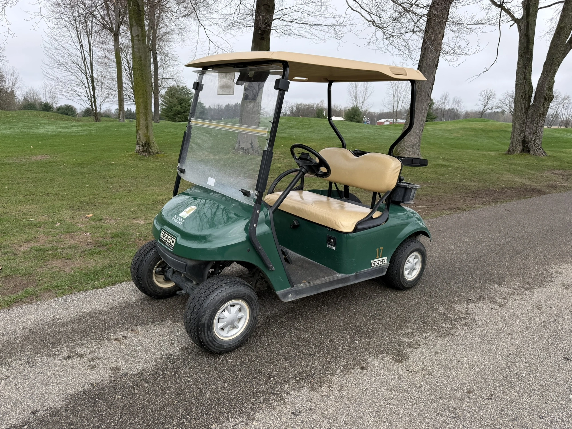 (1) 2015 E-Z-Go golf cart with a Kawasaki gas engine, does not include Club canopy, includes ball wa...