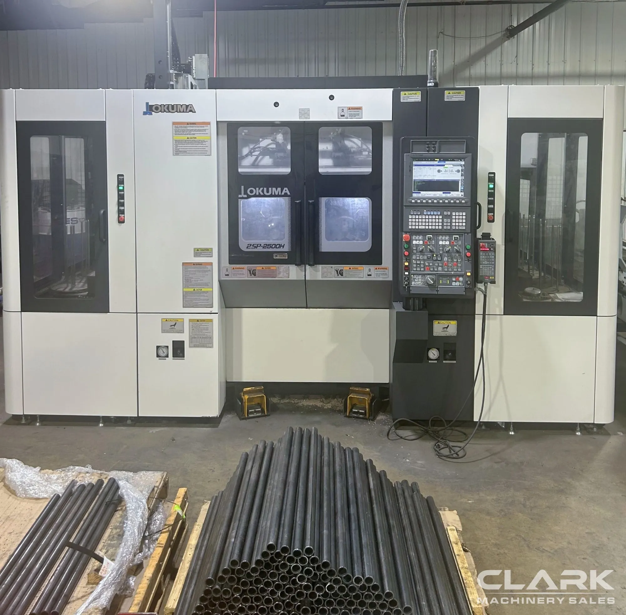 2018 OKUMA 2SP-2500H, GANTRY LOAD/UNLOAD, 10" CHUCKS, 800 CUTTING HOURS