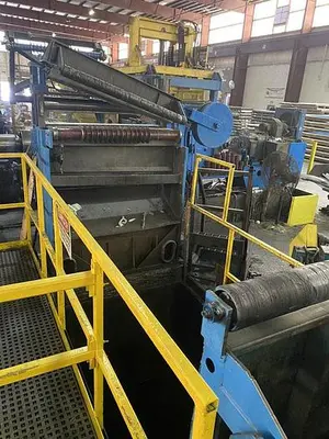 54” x .108” x 40,000 Lbs. Loopco Slitting Line (Used)