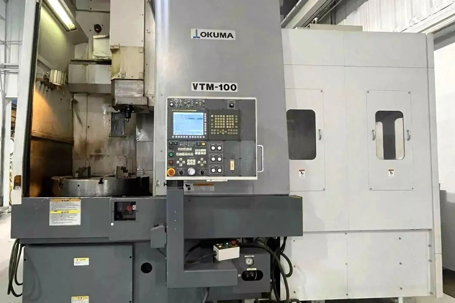 Used OKUMA VTM-100 | CNC 3-Axis Turning Centers