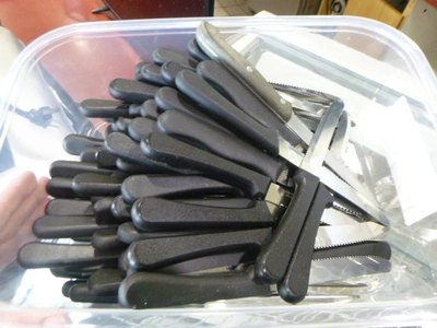 2 Tubs Full of Steak Knives