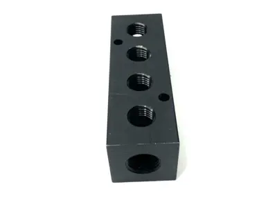 USED POLYCONN PNEUMATIC MANIFOLD 4X 1/4" NPT OUT 3/8"NPT IN