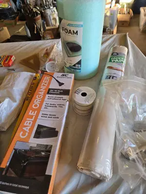 Assorted Office and Craft Supplies including Giant Pencil Decor, Cable Organizer, Glue Stic Foam Cushion Roll, and Miscellaneous Tools