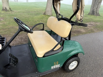 (1) 2017 E-Z-Go golf cart with a Kawasaki gas engine, model 625111G01, includes canopy, ball cover, ...