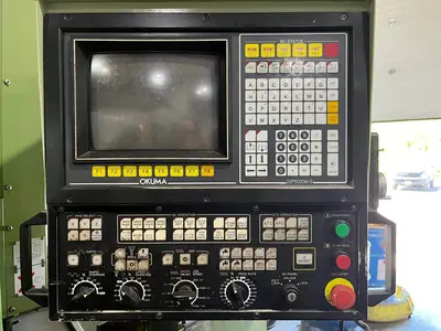 USED 1989 OKUMA MC-4VA