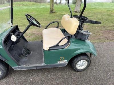 (1) 2015 E-Z-Go golf cart with a Kawasaki gas engine, does not include Club canopy, includes ball wa...