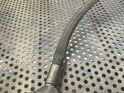 USED 240" STAINLESS STEEL BRAIDED HOSE W/ 1" TO 1/2" SANITARY FITTING
