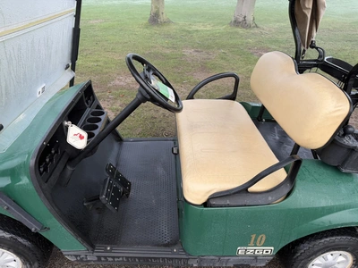 (1) 2015 E-Z-Go golf cart with a Kawasaki gas engine, includes canopy, ball cover, club cover, fold-...