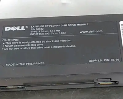 DELL Latitude CP Floppy Disk Drive Module 3.5 in 1.44 MB P/N 66942 Loc3B29