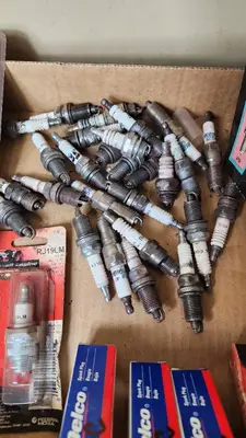 Mixed Brand Spark Plugs and Cleaner Lot including E3, AC Delco, and Champion