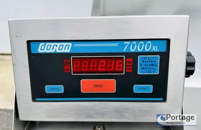 USED HEINZEN MANUFACTURING INTERNATIONAL 2720 MANUAL PACKING TABLE W/ DUAL SCALES