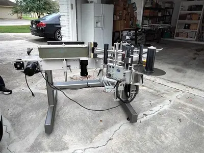 Quadrel model Moduline wraparound pressure sensitive labeler