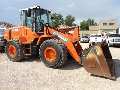 Used 2014 DOOSAN DL 200 Wheel Loaders Manitoba CA | Conquest Truck & Auto Sales #1421356