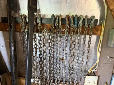 Lot of assorted chains with hook ends, and (1) cable winch puller, 4000 lb. capacity.