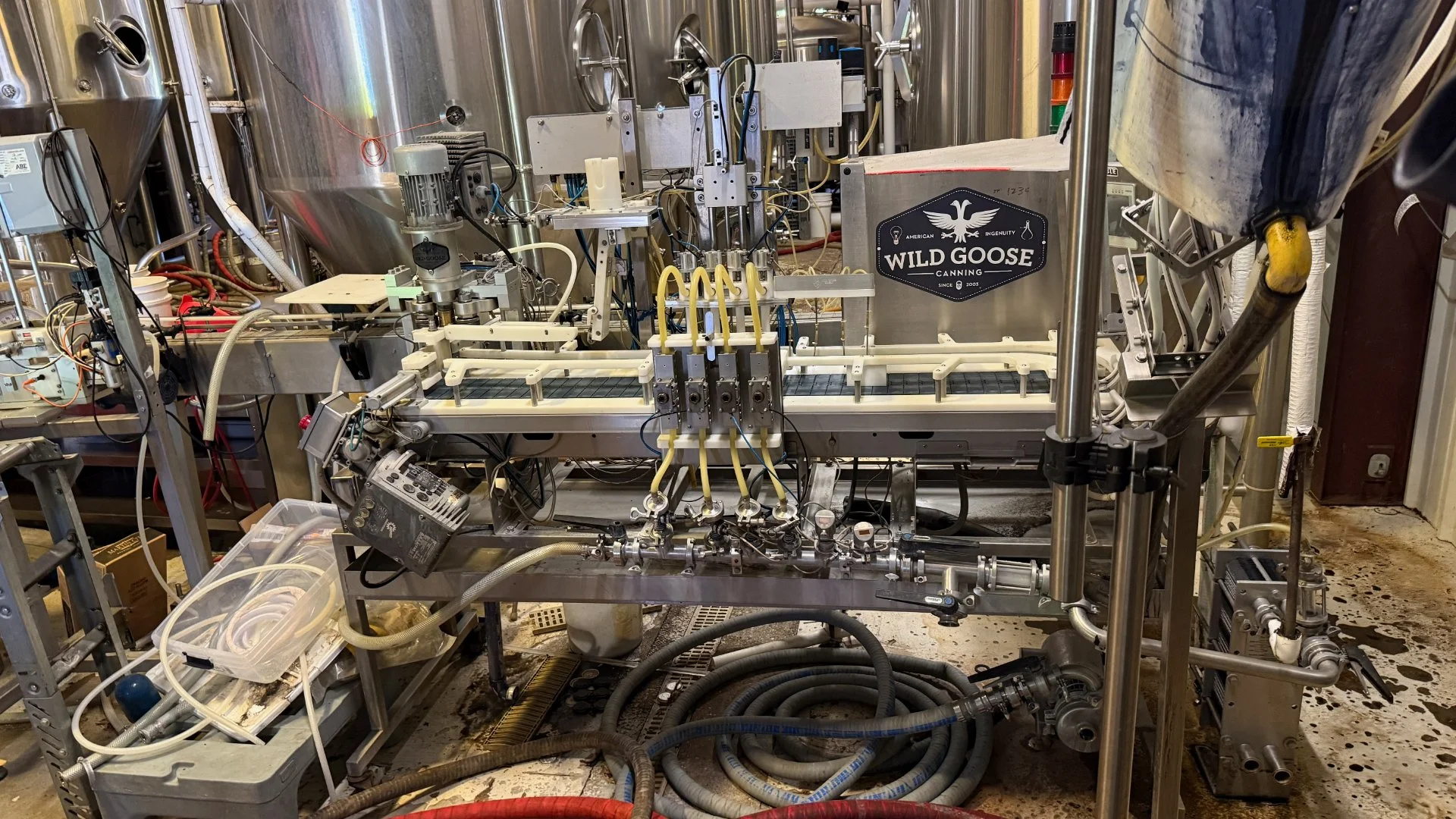 Wild Goose 4 head filler and seamer with depalletizer