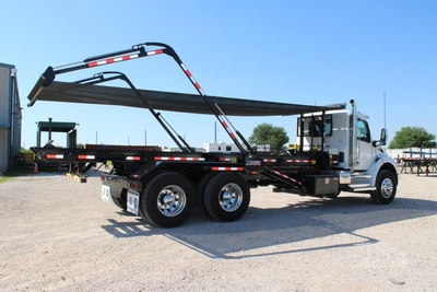 New | in-Stock 2027 PETERBILT 548 Hooklifts & Roll-Offs Texas US | Roll Off Truck World #1492004