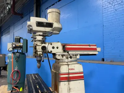 Tri-onics Incorporated 50” X 10”  Vertical Mill