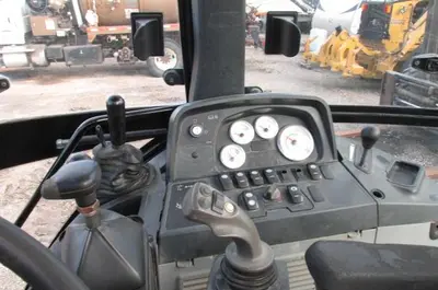 Used 2009 CATERPILLAR 414E IL SKIP /LANDSCAPE LOADER Wheel Loaders Manitoba CA | Conquest Truck & Auto Sales #1421330