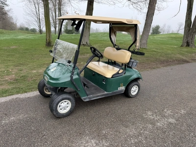 (1) 2015 E-Z-Go golf cart with a Kawasaki gas engine, includes ball washer and Club canopy, ball cov...