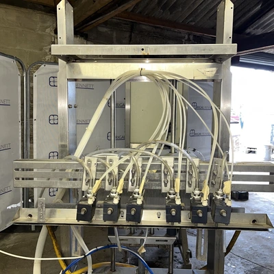 6 Head ELF Filler with feed tanks & container link belt conveyor