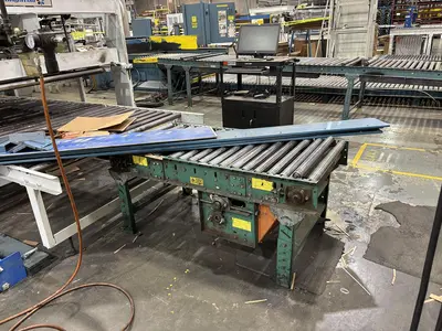 80 feet of 40" wide Bundle Tyer line shaft conveyor