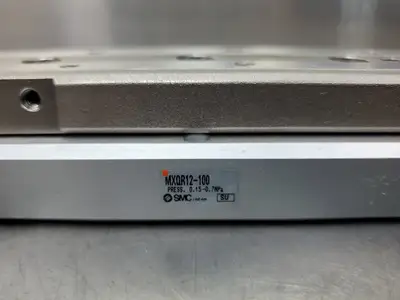 SMC MXQR12-100 0.15-0.7MPa Pressure Cylinder Module. 6-E1