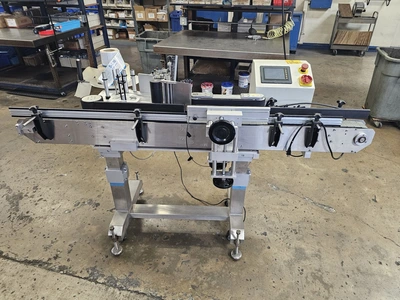 USED 1900 ACCUTEK/CHADAM 2 HEAD GRAVITY FILLER