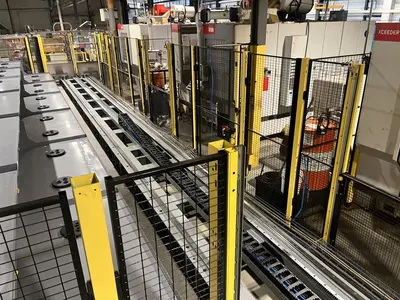 USED FANUC ROBOT + 3 BRETON MACHINING CENTERS 5 AXES