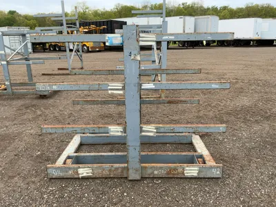 Metal Two Sided Cantilever Rack, on wheels so it can roll sideways (wheels are missing outer coating...