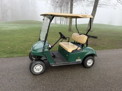 (1) 2017 E-Z-Go golf cart with a Kawasaki gas engine, model 625111G01, includes canopy, ball cover, ...