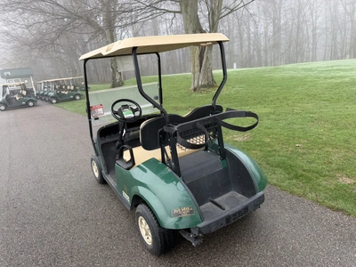 (1) 2014 E-Z-Go golf cart with a Kawasaki gas engine, does not include Club canopy, ball carrier, fo...