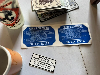 (1) Assorted Allis-Chalmers items including cups, stickers