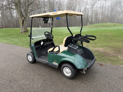 (1) 2015 E-Z-Go golf cart with a Kawasaki gas engine, does not include Club canopy, includes ball wa...