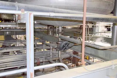 Mason Steel Tank, Approximately 2,500 Gallons, Stainless Steel, Vertical.