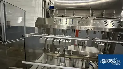 USED Capmatic Capmatic Bottle Filling Line