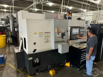 USED 2017 OKUMA GENOS L300MYW-E