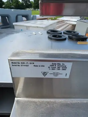 Used Duke Used 24" x 29.5" Duke PS-24 Stainless Top Single Door Cabinet - SS384 - RK Restaurant Equipment (Miscellaneous) Illinois US | Falcon Restaurant Supply #1373806